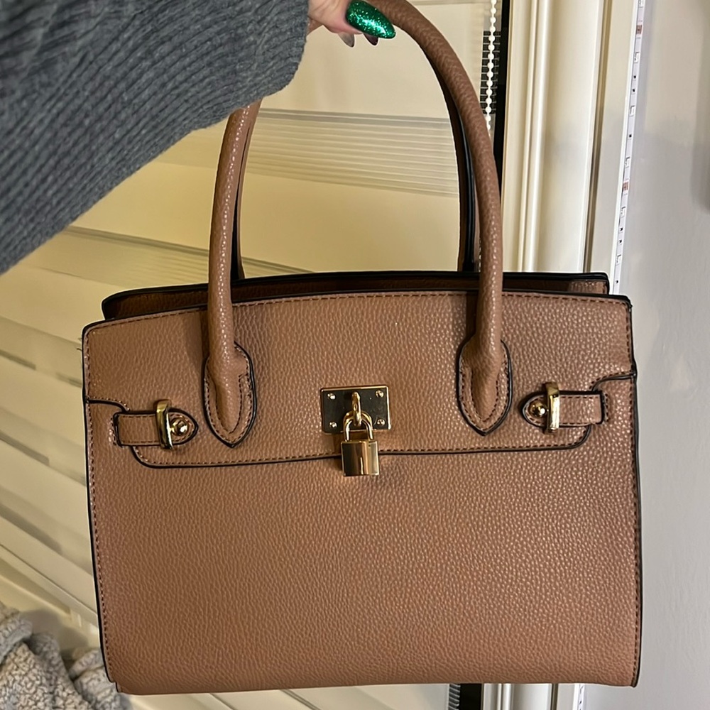 Brown and gold purse